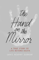The_hand_on_the_mirror